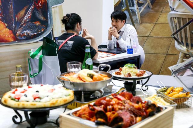 Visitors receive consultations at the 74th World Franchise Expo held at COEX in Seoul on Aug 8 2024 AJU PRESS Kim Dong-woo