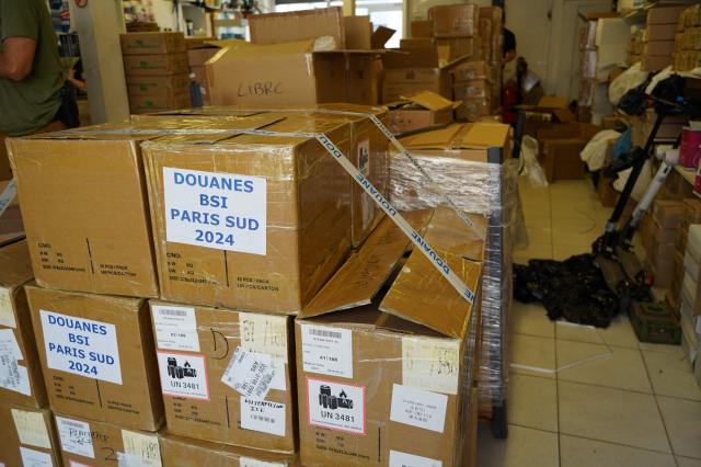 This photograph shows counterfeit products discovered by French customs officers from the Paris south-east brigade during a large seizure operation organised on the occasion of the Paris 2024 Olympic Games in wholesale shops in Aubervilliers northeastern suburb of Paris on July 31 2024 Yonhap