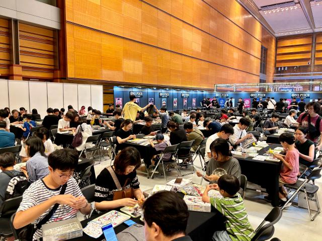 Visitors experience assembling plastic models at the Bandai Namco Korea FUN EXPO 2024 at COEX in Seoul on Aug 9 2024 AJU PRESS Han Jun-gu
