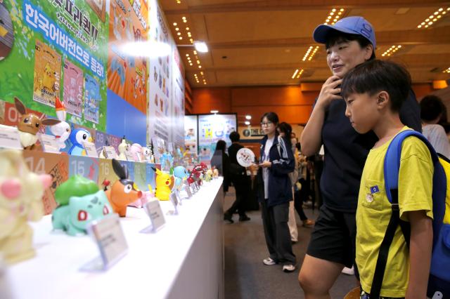 Visitors view Pokemon exhibits at the Bandai Namco Korea FUN EXPO 2024 at COEX in Seoul on Aug 9 2024 AJU PRESS Han Jun-gu
