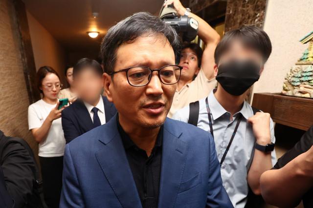 Qoo10 CEO Koo Young-bae arrives at his home for the prosecutors search and seizure operation on August 1 2024 