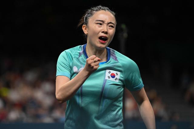 South Koreas Jeon Ji-hee celebrates a point during her womens table tennis singles match in the team bronze medal match between South Korea and Germany at the Paris 2024 Olympic Games at the South Paris Arena in Paris on Aug 10 2024 AFP-Yonhap