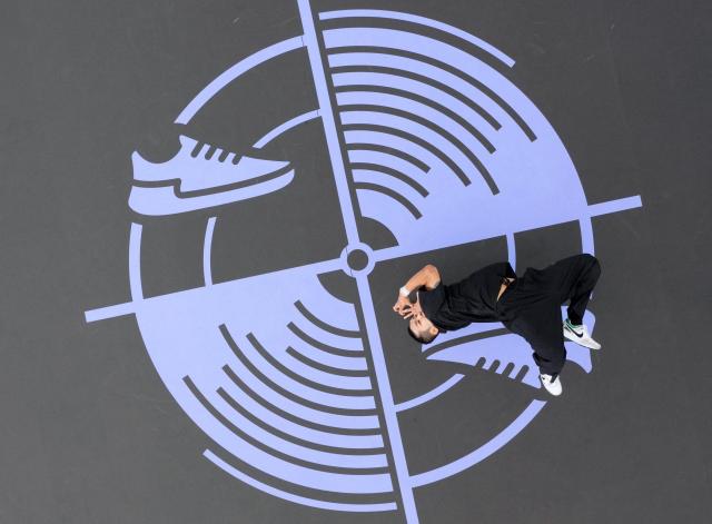 Hongten of South Korea battles Lee of the Netherlands during their B-Boys Round Robin - Group C battle of the Breaking competitions in the Paris 2024 Olympic Games at the La Concorde in Paris France 10 Aug 2024 Reuters-Yonhap