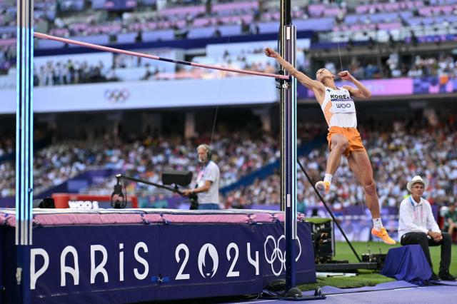 South Koreas Woo Sang-hyeok competes in the mens high jump final of the athletics event at the Paris 2024 Olympic Games at Stade de France in Saint-Denis north of Paris on August 10 2024 AFP-Yonhap