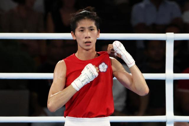 Yu Ting Lin of Taiwan celebrates winning the Womens 57kg gold medal bout of the Boxing competitions in the Paris 2024 Olympic Games at Roland Garros in Paris France on August 10 2024 EPA-Yonhap