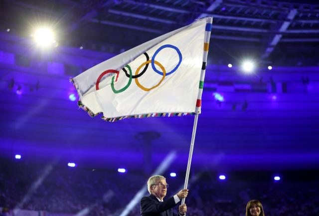 Athletes take a selfie during the Paris 2024 Olympics closing ceremony at Stade de France in Saint-Denis France on Aug 11 2024 REUTERS-Yonhap