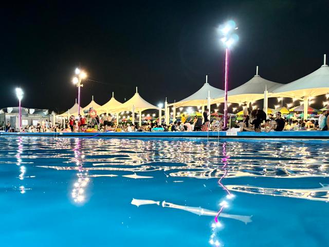 Visitors take a rest in the relaxation area next to the swimming pool at Han River Park Yeouido Seoul on August 9 2024 AJU PRESS Han Jun-gu