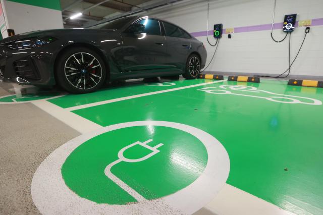 Electric vehicles charging at a parking lot in Seoul South Korea May 9 2024 Yonhap