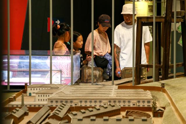 Visitors view exhibits in the exhibition hall at Seodaemun Prison Seoul on Aug 14 2024 AJU PRESS Kim Dong-woo