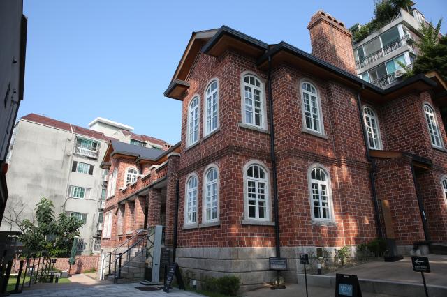 Perched atop a hill in Seouls Jongno District Dilkusha also known by its neighbors as the red brick house overlooks the central city area Aju Press Han Jun-ku