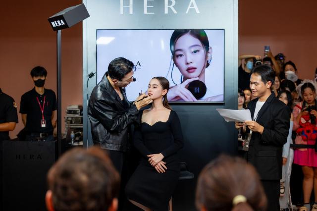 The image shows a makeup demonstration at Heras pop-up event in Central Chidlom Bangkok showcasing the brands Thailand launchCourtesy of Amorepacific