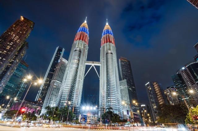 The image shows the Kuala Lumpur Convention Centre a prominent landmark in Malaysias capital city Getty Images Bank