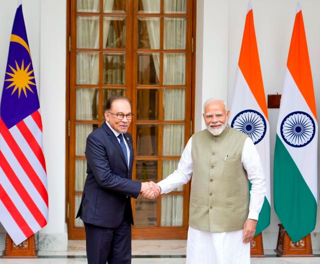 Indian PM Modi greets Malaysian counterpart Anwar Ibrahim before their meeting in New Delhi on August 20 2024 Yonhap