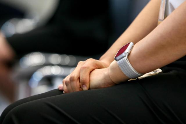 A visitor clasps hands at the Finance Job Fair 2024 held at Dongdaemun Design Plaza in Seoul on Aug 21 2024 AJU PRESS Kim Dong-woo