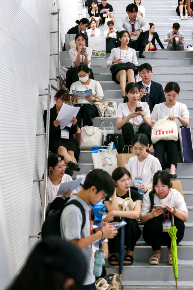 Visitors wait for interviews at the Finance Job Fair 2024 held at Dongdaemun Design Plaza in Seoul on Aug 21 2024 AJU PRESS Kim Dong-woo