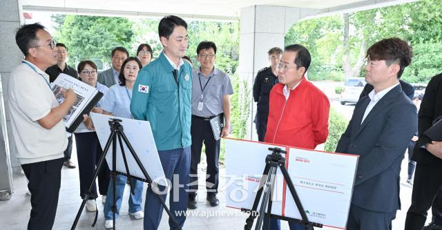 대구시 홍준표 시장은 21일 대구교도소 후적지를 방문해 후적지 개발 현황 및 우선활용 방안에 대한 설명을 최재훈 달성군수에게 청취하고 현장을 점검했다 사진대구시