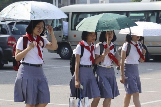 North Korean students walk on the street in Pyongyang on Aug 14 2024 AP-Yonhap