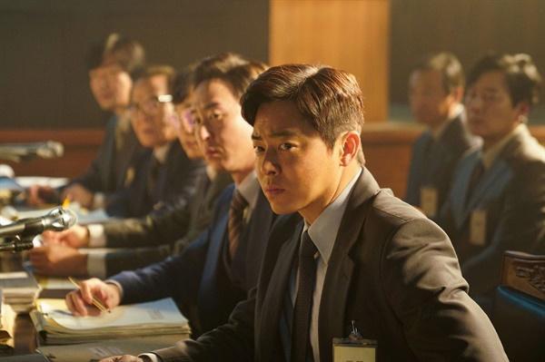 This image shows  Cho Jung-suk who plays the lawyer defending the colonel in Land of Happiness   Courtesy of NEW