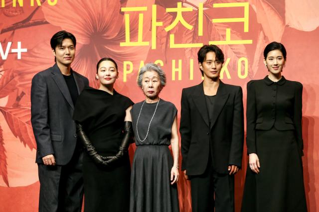 Cast members pose for a commemorative photo at the press conference for Pachinko 2 held in Gangnam-gu Seoul on Aug 23 2024 AJU PRESS Kim Dong-woo