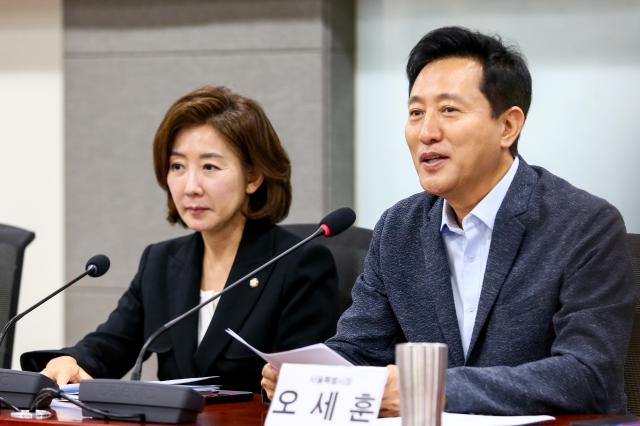 Seoul Mayor Oh Se-hoon right delivers opening remarks at a seminar held at the National Assembly on Aug 27 2024 AJP Kim Dong-woo