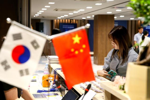 A participant registers for the Korea-China Digital Economy Partnership Summit in Jung-gu Seoul on Aug 28 2024 AJP Kim Dong-woo