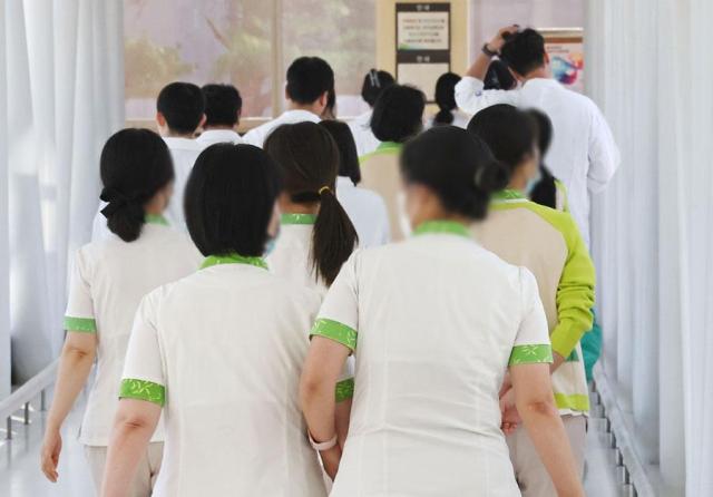 Nurses walk through a corridor at a hospital in Seoul on Aug 28 2024 Yonhap