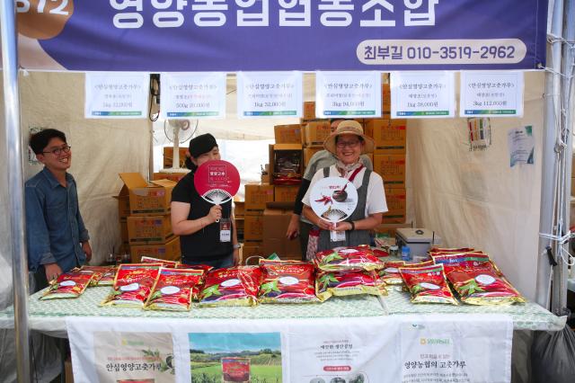 A booth staff member sells red chilli peppers at the HOT Festival held in Seoul Plaza August 29 2024 AJP Han Jun-gu