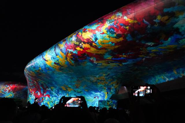 Visitors photograph media facade at Seoul Light DDP 2024 Autumn Aug 29 2024 AJP Park Jong-hyeok