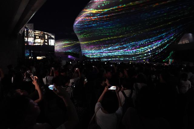 Visitors photograph media facade at Seoul Light DDP 2024 Autumn Aug 29 2024 AJP Park Jong-hyeok