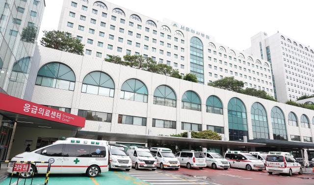 Ambulances are on stand-by at the Asan Hospital in eastern Seoul on September 2 Yonhap Photo