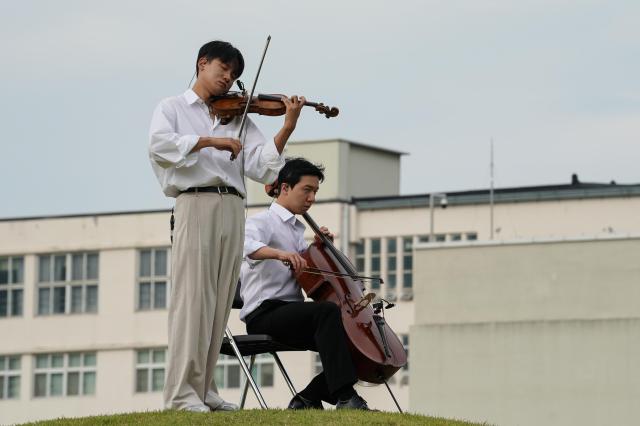 Musicians perform at the opening ceremony of the Seoul Sculpture Festival in Songhyeon Green Plaza Jongno District Seoul Monday Sept 2 2024 AJP Park Jong-hyeok