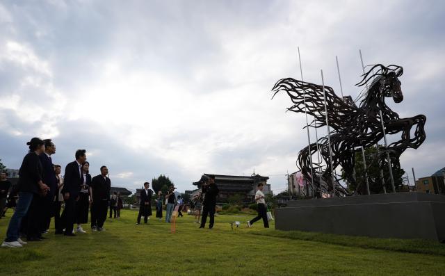 Seoul Mayor Oh Se-hoon views the sculpture Wind-Horse of Sky by Kang Sung-hun at the Seoul Sculpture Festival in Songhyeon Green Plaza Jongno District Seoul Monday Sept 2 2024 AJP Park Jong-hyeok