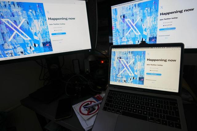 Computer monitors and a laptop display the X formerly known as Twitter sign-in page in Belgrade Serbia on July 24 2023 AP-Yonhap