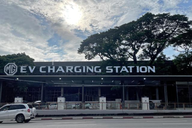 Electric vehicles are charged in Yangon, Myanmar, on Sept. 2, 2024. EPA-Yonhap