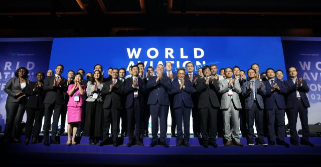 Luis Felipe de Oliveira Director General of ACI World seventh from right front row and Lee Hag-jae President  CEO of Incheon Intl Airport Corp sixth from right front row pose for a commemorative photo with dignitaries at the 2024 World Aviation Conference in Incheon on Sept 3 AJP Han Jun-gu