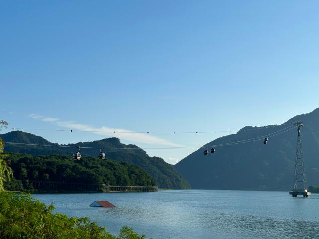 A cable car crosses over the Bukhan River from Samcheon-dong in the eastern city of Chuncheon Aug 31 2024 AJP Han Jun-gu