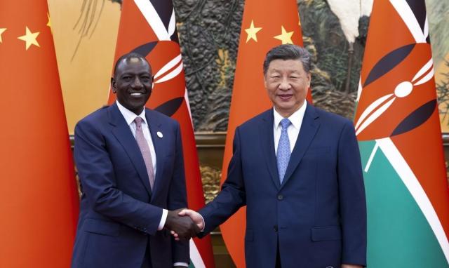 Chinese President Xi Jinping right shakes hands with Kenyan President William Ruto at the Great Hall of the People in Beijing on Semptember 3 Yonhap