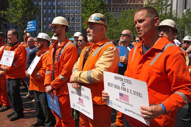 This photo shows US Steel employees rallying outside the United Steel Tower in Pittsburgh to display their support for the transaction with Nippon Steel Sept 4 2024 AP - Yonhap