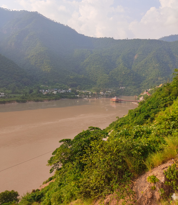 This photo shows a monsoon river flowing through the mountains of the Himalayas in India Getty Images Bank