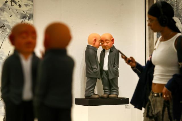 A visitor view artworks at the international art fair Kiaf SEOUL held at COEX in Seoul on Sep 5 2024 AJP Kim Dong-woo