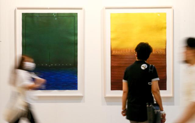 A visitor view artworks at the international art fair Kiaf SEOUL held at COEX in Seoul on Sep 5 2024 AJP Kim Dong-woo