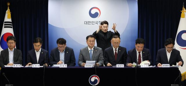 This photo shows related ministries and departments gathered together to announce comprehensive safety management plans for electric vehicles EV chaired by Prime Minister Han Duck-soo Sept 6 2024 Yonhap