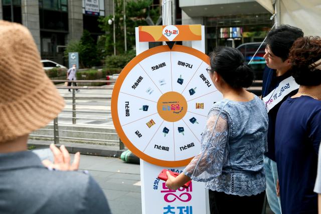 Visitors participate in events at the K-Shopping Festa at Cheonggye Plaza in Seoul on Sept 9 2024 AJP Kim Dong-woo