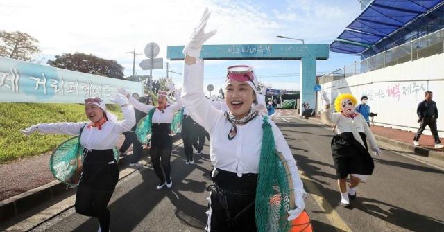 Haenyeo or Korean female divers hold a street parade to mark the opening of  the 15th Jeju Haenyeo Festival near the Jeju Haenyeo Museum in Gujwa-eup on September 24 2022 Yonhap