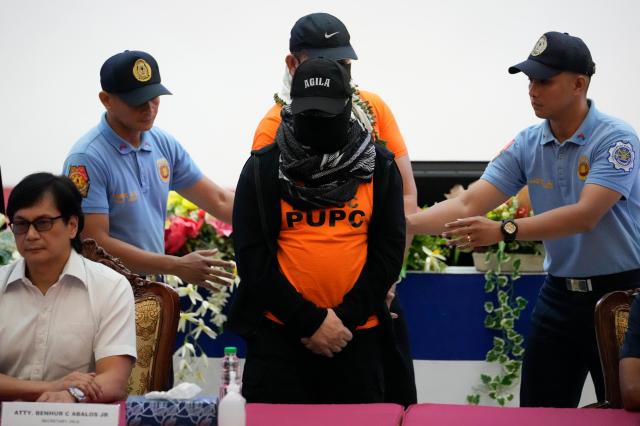 Apollo Quiboloy a Filipino preacher facing sexual abuse and human trafficking charges in both the Philippines and the US was led into police custody at Camp Crame in Quezon City on Monday September 9 2024 AP-Yonhap