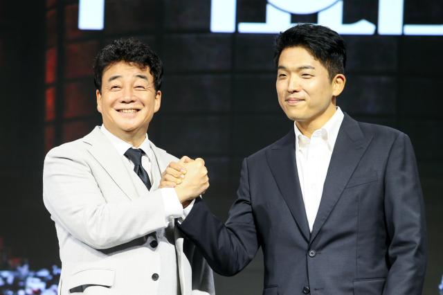 Baek Jong-won CEO left of The Born Korea and Chef Ahn Sung-jae pose during a press conference for Culinary Class Wars in Jongno-gu Seoul on Sept 11 2024