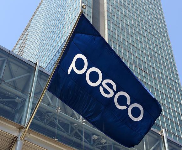 This photo shows POSCOs logo waving on a flag Courtesy of POSCO