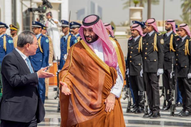 Saudi Crown Prince Mohammed bin Salman greets Chinese Premier Li Qiang in Riyadh on Sept 11 2024 AFP-Yonhap