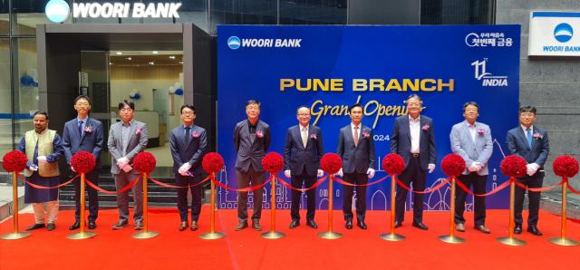 This photo shows Woori Banks Pune branch opening ceremony Courtesy of Woori Bank