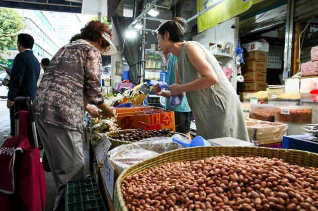 A shopper browses goods at Kyungdong Market in Dongdaemun-gu Seoul on Sept 13 2024 AJP Kim Dong-woo